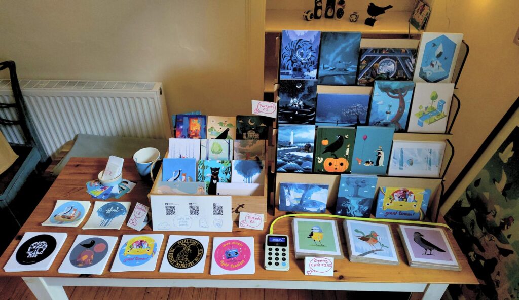 A front view of my stall with lots of stickers and post and greeting cards.